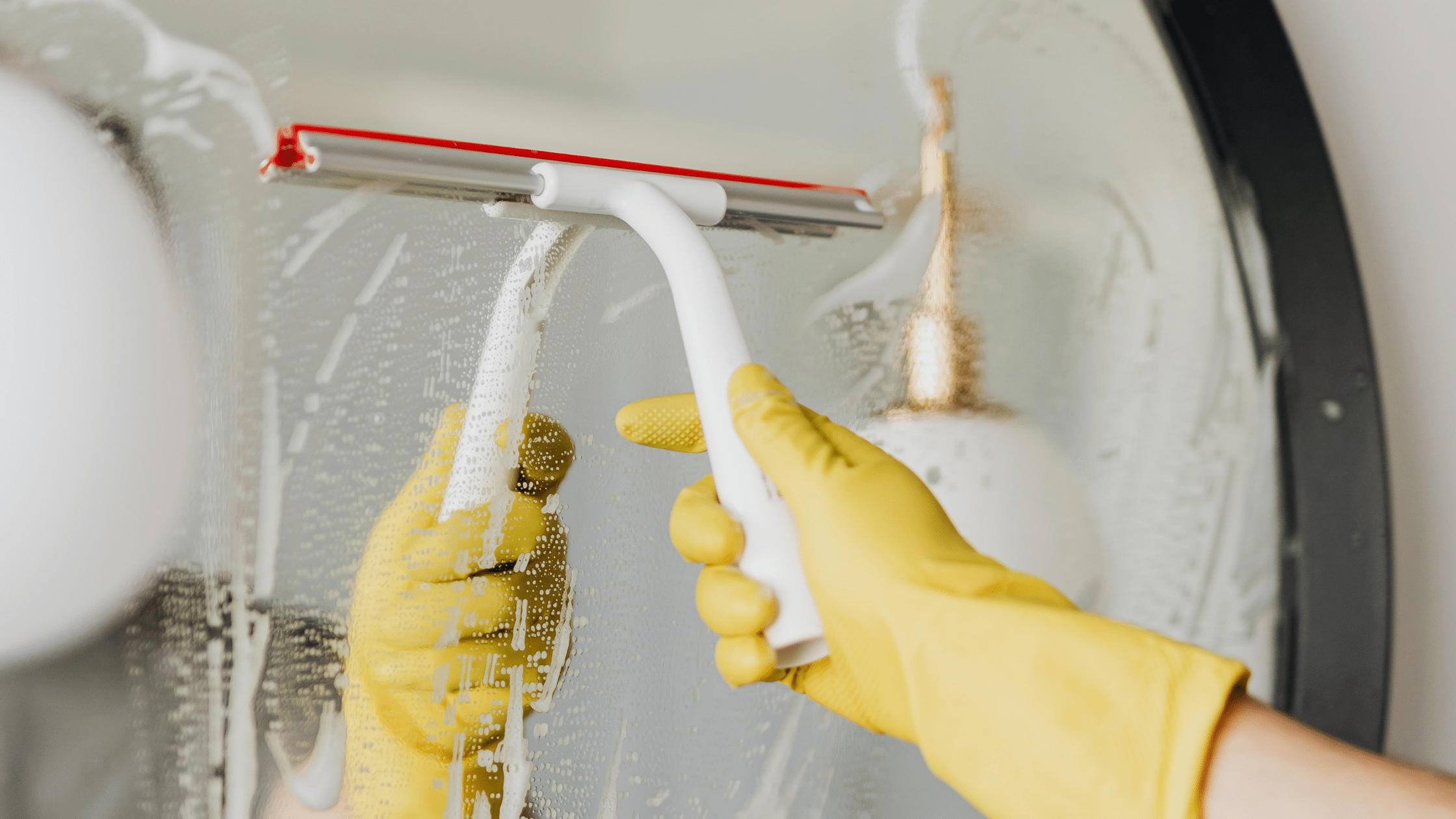 cleaning mirror in new home