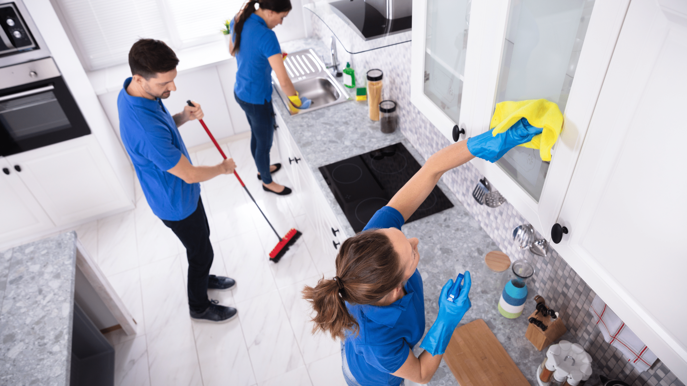 professional team cleaning kitchen